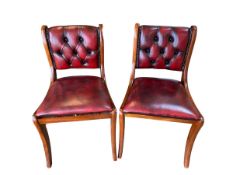 Pair of Regency style mahogany framed, red leather upholstered button back hall chairs