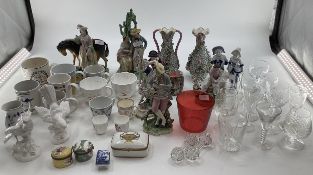 A mixed collection of ceramics and glassware to include Staffordshire figures, Blanc de Chine, Birds