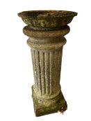 A weathered garden Pestel column, with circular bird bath to top 101cm high