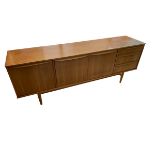 A modern suite of furniture, including a long low side cabinet - (G plan), of 198cm W x 46cmD x 74