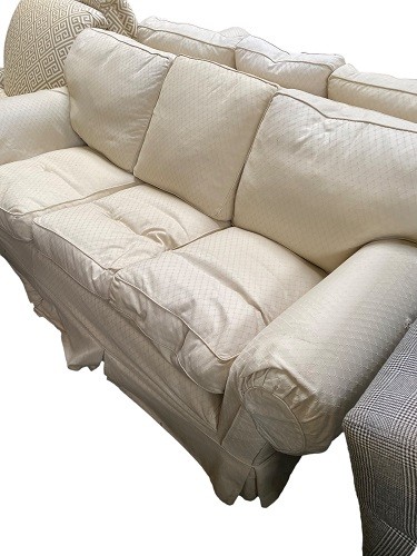 Pair of cream upholstered three seater sofas, 225cmL, with some wear, sold as seen (2 sofas) - Image 2 of 4