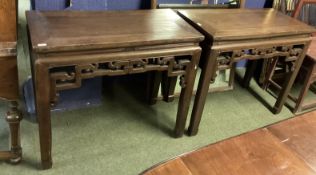A pair of C19thc style Chinese hardwood side or Alter tables, stylised carved and pierced frieze