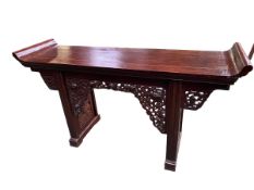 A C19th style Chinese alter table with carved and pierced fretwork decoration, 171 x 94 x 48cm
