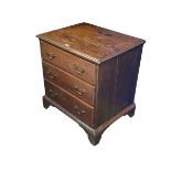 A small Georgian oak chest of three long graduated drawers on plinth base , as found 58cm W x 74