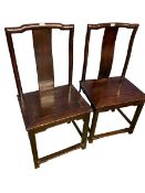 A pair of C19th style Chinese hardwood chairs slatbacks with square stretchers 106 x 41