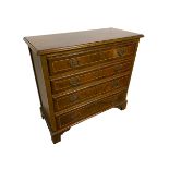 A good oak and walnut chest of 4 long graduated drawers, 84cmH x 92cmW x 41cmD