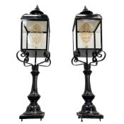 A good pair of cast metal external pedestal lanterns, circa 1900, been recently restored and