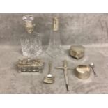 A collection of sterling silver items, to include silver topped dressing table items, heart shaped