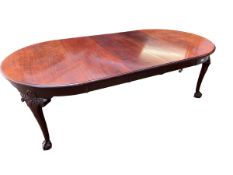 A C19th style mahogany extending dining table, D-End with ball and claw feet, 243 x 121 x 76cm,