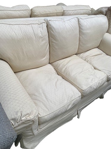 Pair of cream upholstered three seater sofas, 225cmL, with some wear, sold as seen (2 sofas) - Image 3 of 4