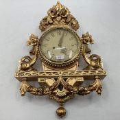 French giltwood cartel wall clock with domed glass white metal face with Arabic markers decorated