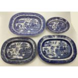 Four ceramic Willow Pattern serving dishes, largest 43cm x 35cm