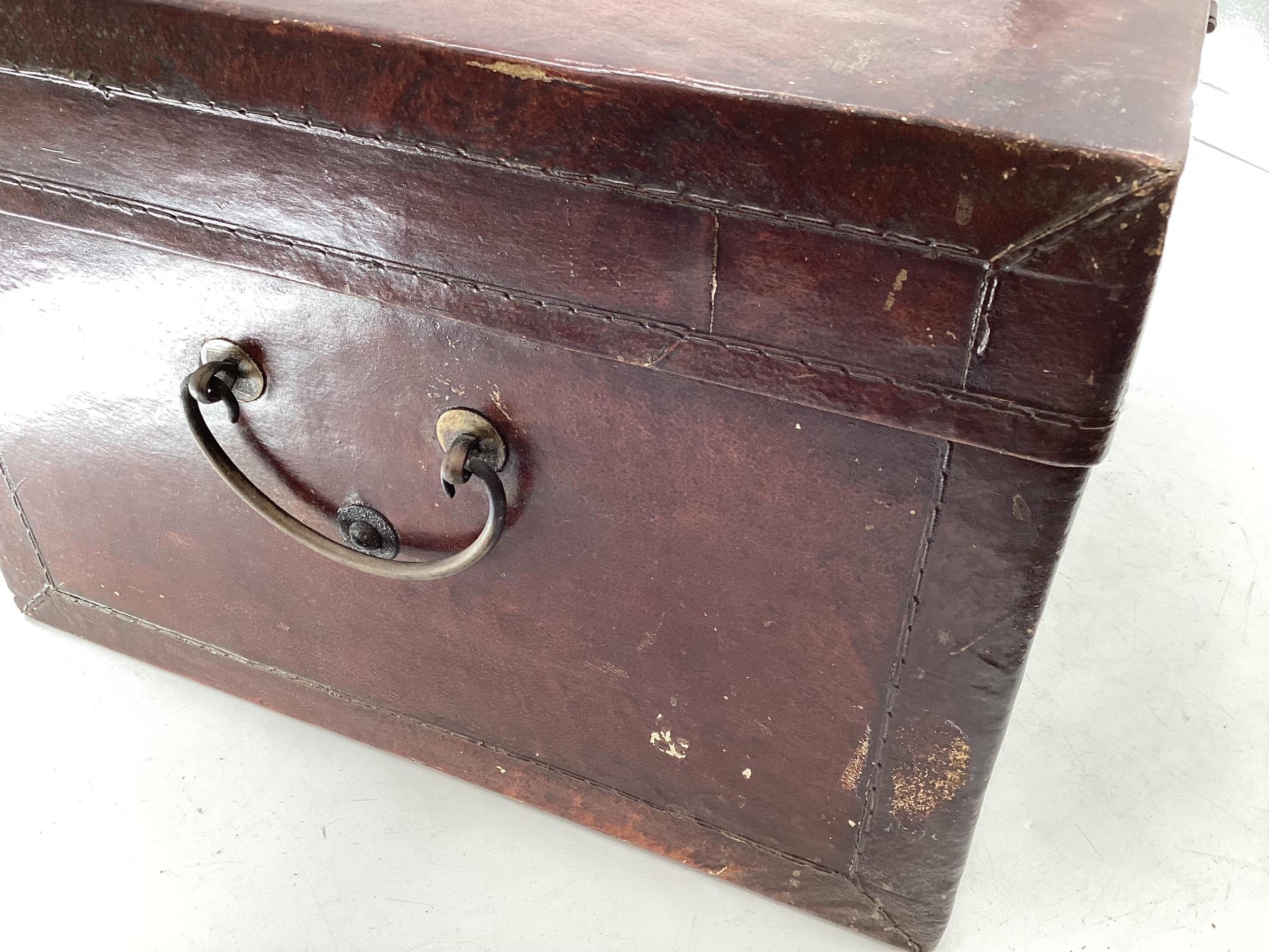 A near pair of Chinese C19th style lacquer trunks with fabric lined interiors and brass carry - Image 3 of 21