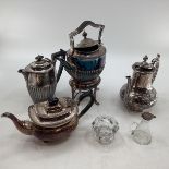 Collection of silver plated wares to include kettle on burner, ornately decorated teapot and small