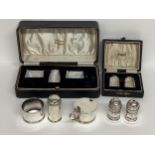 Boxed sterling silver cruet set, and a boxed sterling silver pepperettes