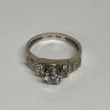 An 18ct white gold and CZ set ring 4.00 grams