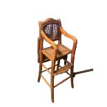 Two C19th style Chinese hardwood child's high chairs, one with lift over tray table, rattan seat and