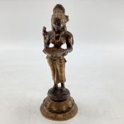 A South Asian bronze figure of Deepa Lakshmi (representation of the Hindu Goddess Lakshmi) symbol of