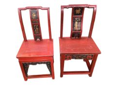 Two similar C19th/C20th Chinese red lacquered arm chairs with slat backs, bow fronts and stretchers,