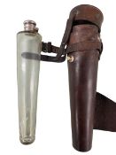 A Gentleman's leather conical saddle flask, with a glass liner with plated hinged collar,