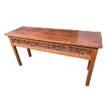 An early C20th Chinese hard wood side or alter table, stylised pierced frieze on square legs, 160