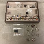 A large collection of mainly sterling silver and gem/paste set jewellery. 40+ rings , pendants