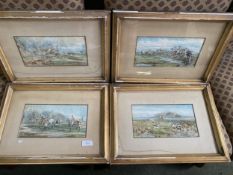 A set of four framed and colloured watercolours of foxhunting scenes, signed lower left, some