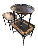 Three decorative black and gilt tables with tray to top (one fixed top, two with loose tray tops)