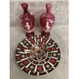 A collection of Royal Crown Derby items together with two etched cranberry glass vases manner of