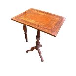 A Continental inlaid multi wood oblong tripod table on turned pedestal column to tripod base, with
