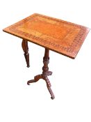 A Continental inlaid multi wood oblong tripod table on turned pedestal column to tripod base, with