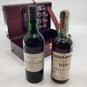 Two bottles of vintage port Dalva Porto 1982, Taylors Quinta de Vargellas 1967. Contained within a