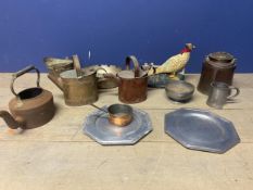 A mixed collection of metalware to include brass and copper items .