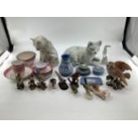 A pink lustre ware tea set together with two ceramic cats , Wedgwood items, birds etc.