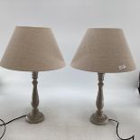 Pair of contemporary grey painted lamp bases with linen style circular shades