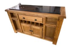 A good modern island unit with black slate central top , the base with multi drawers, 148 cm Long