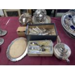 A collection of silver plated ware to include a kings pattern cutlery service.
