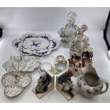 A mixed collection of ceramics to include KPM and Worcester serving dishes, a blanc de chine bust of