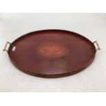 A Georgian mahogany galleried tray with brass handles. 62cm x 39cm.