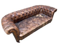 For restoration: a good brown leather Chesterfield sofa, button backed and brass studded on castors,