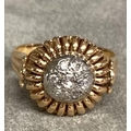 An 18ct stamped rose gold and diamond ring. . 3.5g Size M.