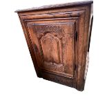 A rustic country style Continental oak single carved -door side cupboard, with drawer beneath , with