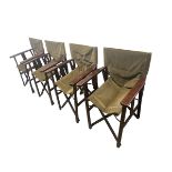 Set of four folding directors chairs, as found with some wear to fabric, and some cushions