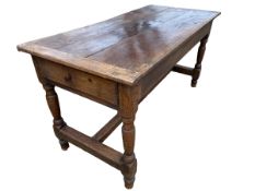 An Oak three plank top kitchen table, with stretcher to base, 151cm L, x 71cmW x78cmH