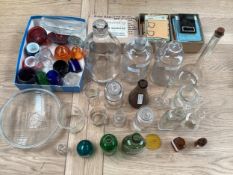 A collection of glassware mainly by Wood Bros Barnsley relating to chemistry and chemical storage.