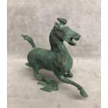 A Bronze model of a horse 15cm.