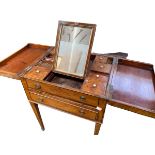 A Regency mahogany and line inlaid gentleman's fold out wash stand the two top doors opening to
