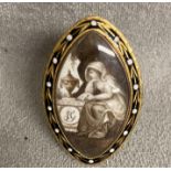 An unmarked yellow metal memorial ring Navette shaped plaque . Inscription verso John Gray Ob 26