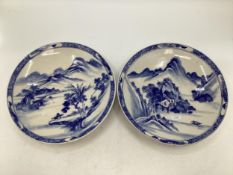 A pair of Oriental, blue and white chargers 40cm (d)