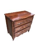 A small Continental oak chest of 3 long drawers, 88cmW x 50D x 80cmH and a mahogany chest of 3